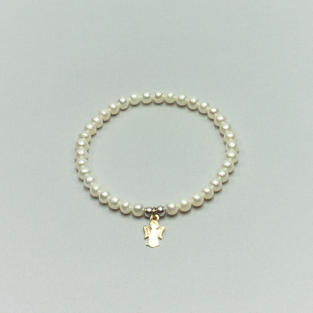 Bracciale elastico di Perle Bianche d'Acqua Dolce con angelo custode in Argento